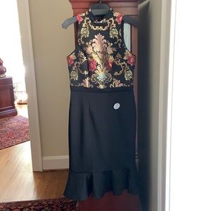 NWT. Black embroidered high neck dress.
